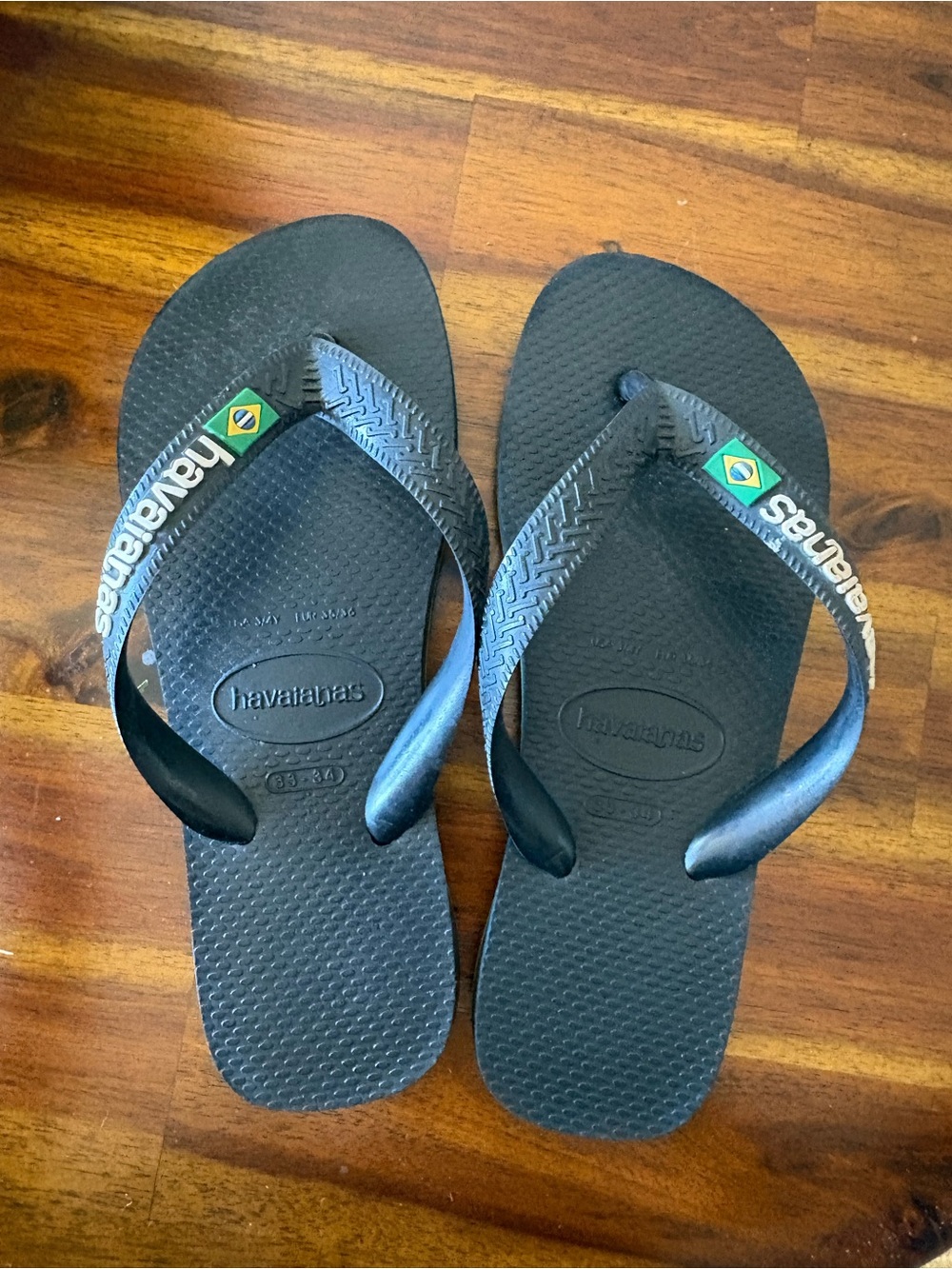 Havaianas Black Flip Flops with Brazil Flag Accent
